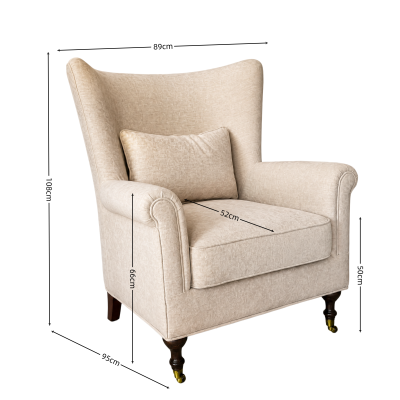 fabric wingback armchair with lumbar pillow