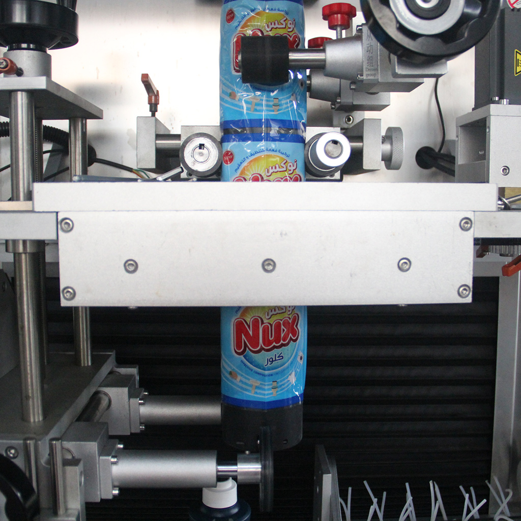 automatic shrink sleeve applicator machine