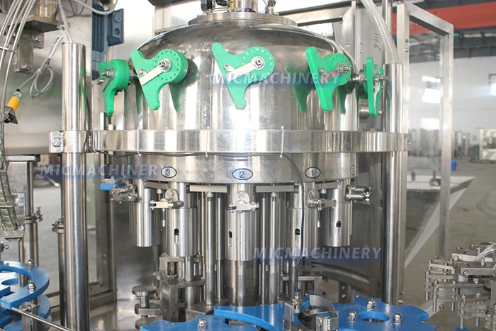 Soft drink bottle filler
