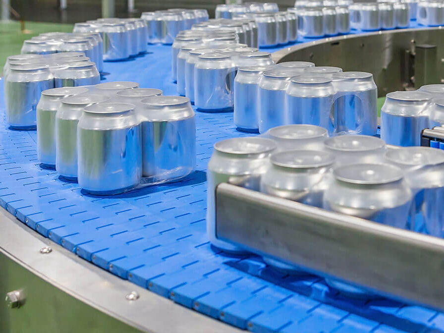 packed can on conveyor belt