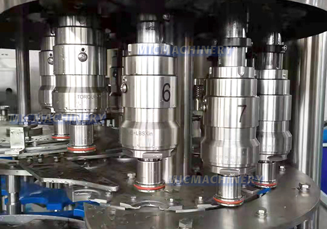 Capping Part of Cold Drink  Bottle Packing Machine