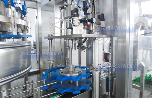 capping part of beer bottling machine