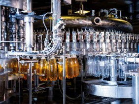 Carbonated drink filling equipment pictured on the MIC website