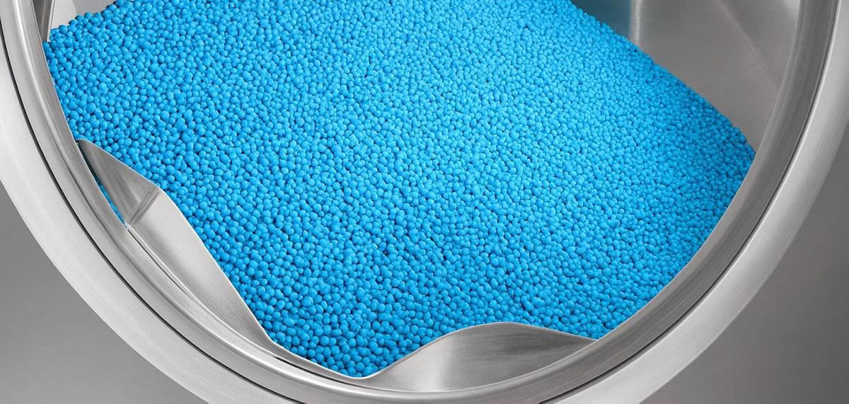 Process of coating pills