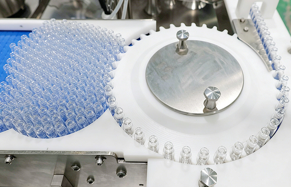 Automatic vial feeding system