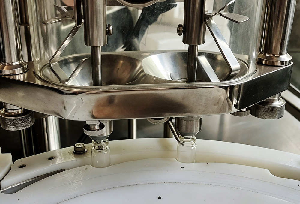 Automatic vial filling process