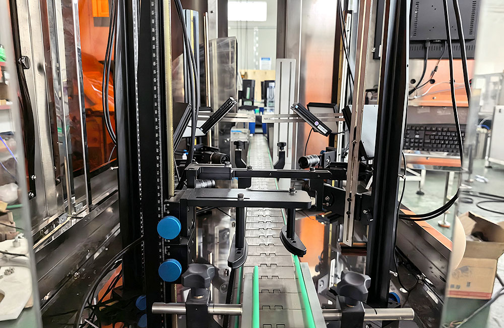 Bottle inspection conveyor