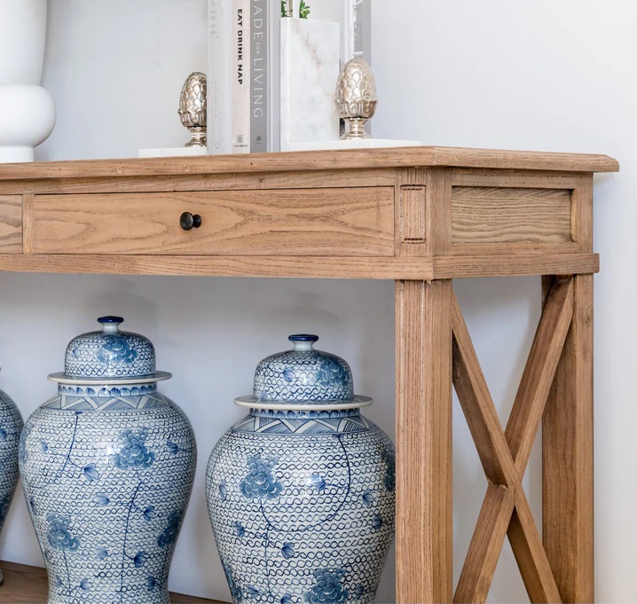 console table behind sofa