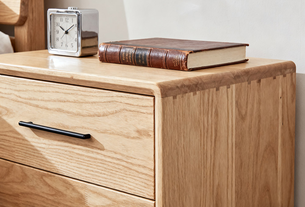 bedside table by the bed