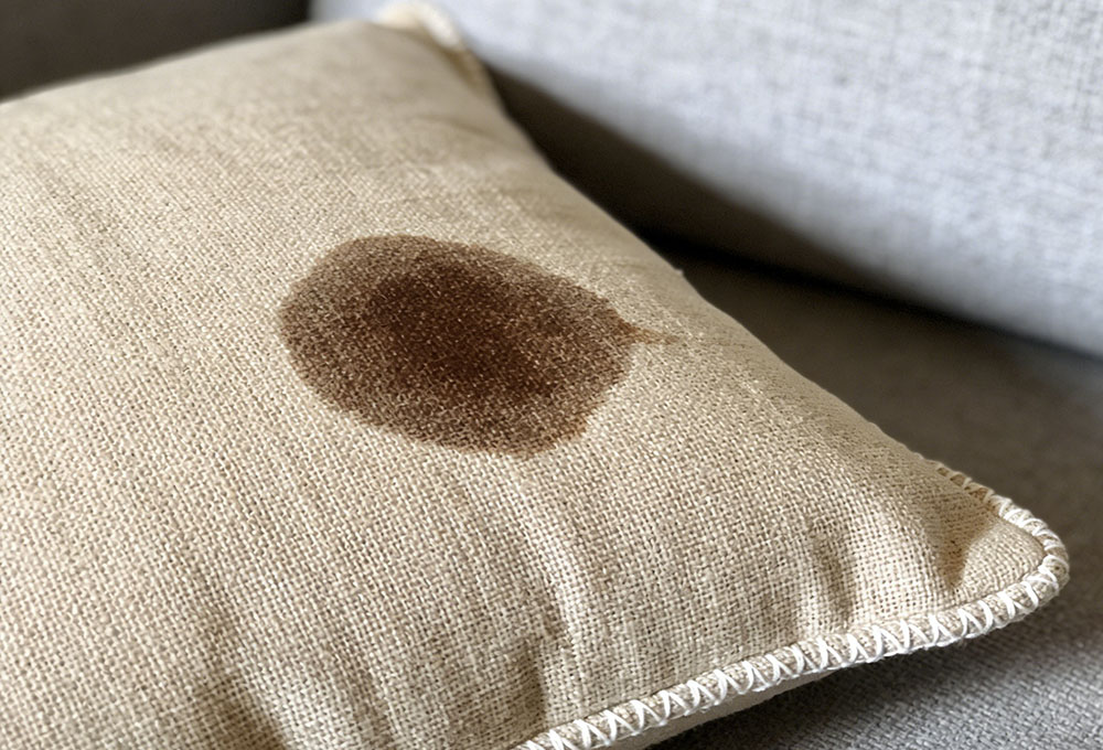 a sofa cushion stained with stains