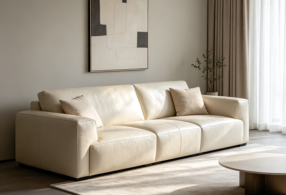 cream leather three-seat sofa